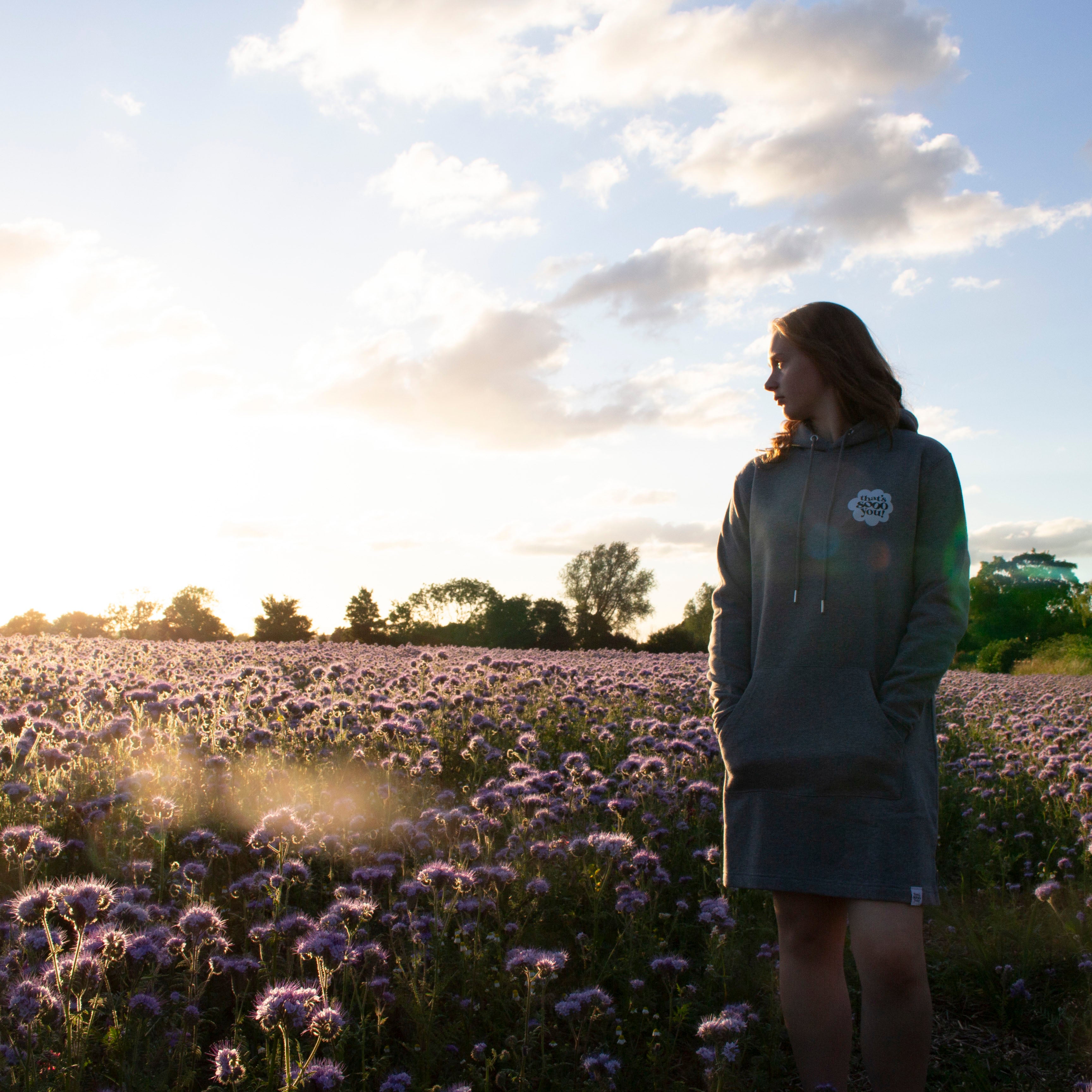 That's Sooo You Logo Dark Grey Longline Sweatshirt Dress, Rainbow Flower Design on Back and Chest, Field, purple flowers, sunset, golden hour