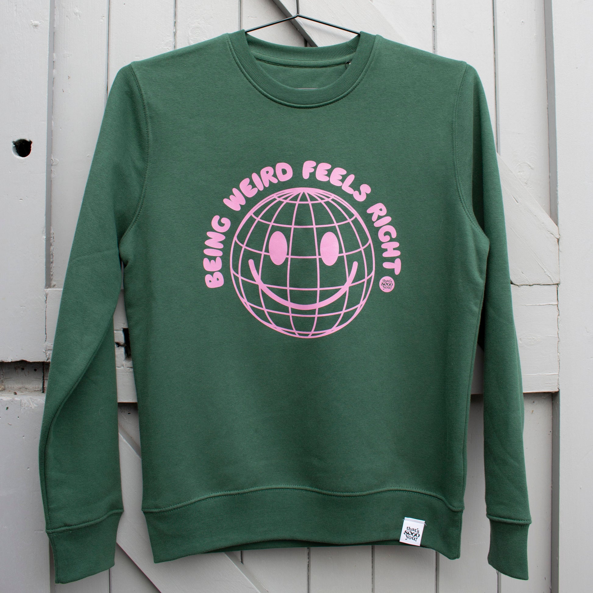 That's Sooo You Being Weird Feels Right sweatshirt, smiley face, TSY, bottle green, pale pink, dopamine dressing, colourful fashion